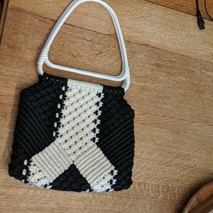 Black and white crochet purse with wooden handles